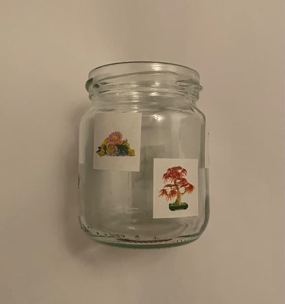 Glasvase mit Pflanzenstickers