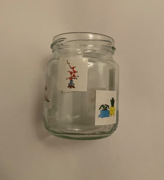 Glasvase mit Pflanzenstickers
