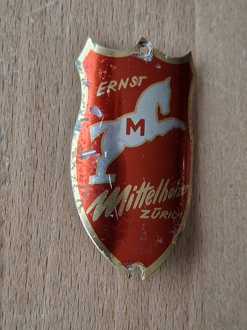 Ernst Mittelholzer Steuerkopf  CH  Schild Emblem